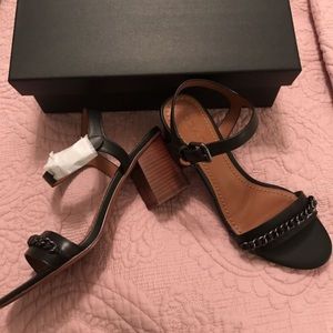 Coach sandal w charm and wooden block style heel